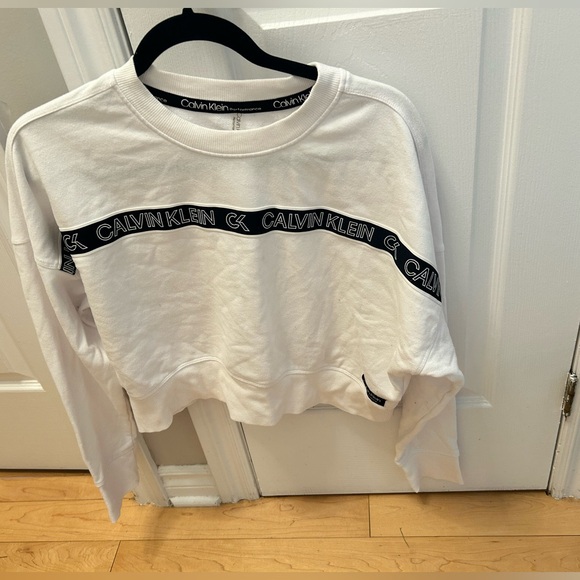 Calvin Klein, white and black crew neck, crop top (mid length). Size medium. - Picture 1 of 3